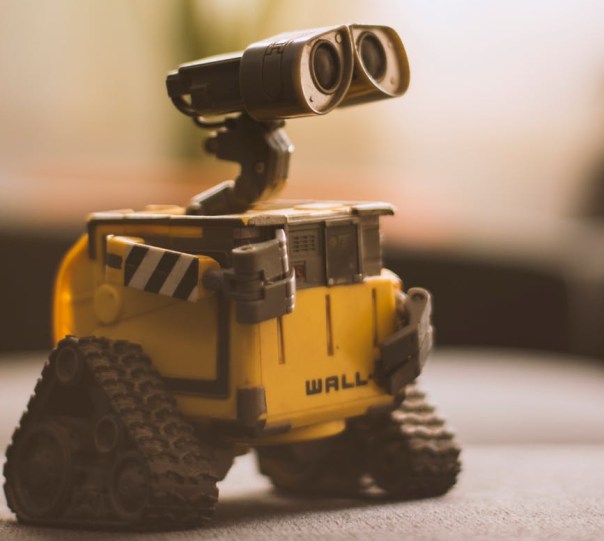 wall e toy on beige pad